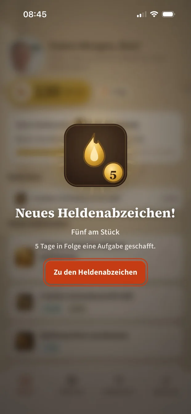 Feier-Moment in der App: ein neues Heldenabzeichen wird freigeschaltet